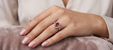 Oval ruby halo ring