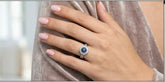 Sapphire sunburst double halo ring