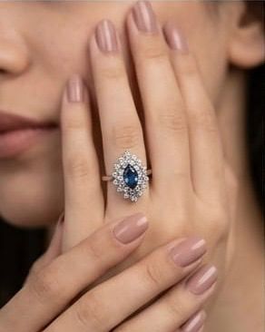 Marquise blue topaz starburst cluster ring