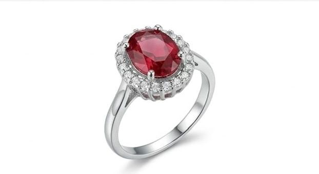 Oval ruby halo ring