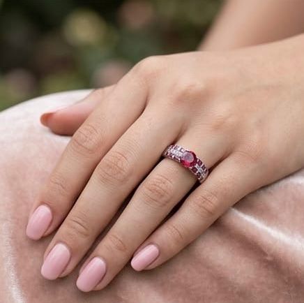Round ruby & princess cut channel band ring