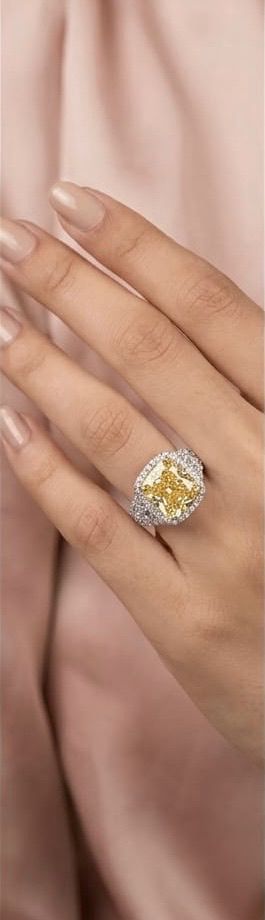 Cushion cut yellow solitaire ring